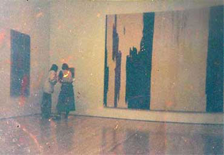 When the museum first noticed the painting, then came back with a bigger group to take off the wall.